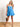 Model is wearing a blue cutout romper.