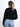 Model is wearing a black zip up sweater jacket.
