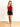 Model is wearing a maroon one shoulder bodysuit.