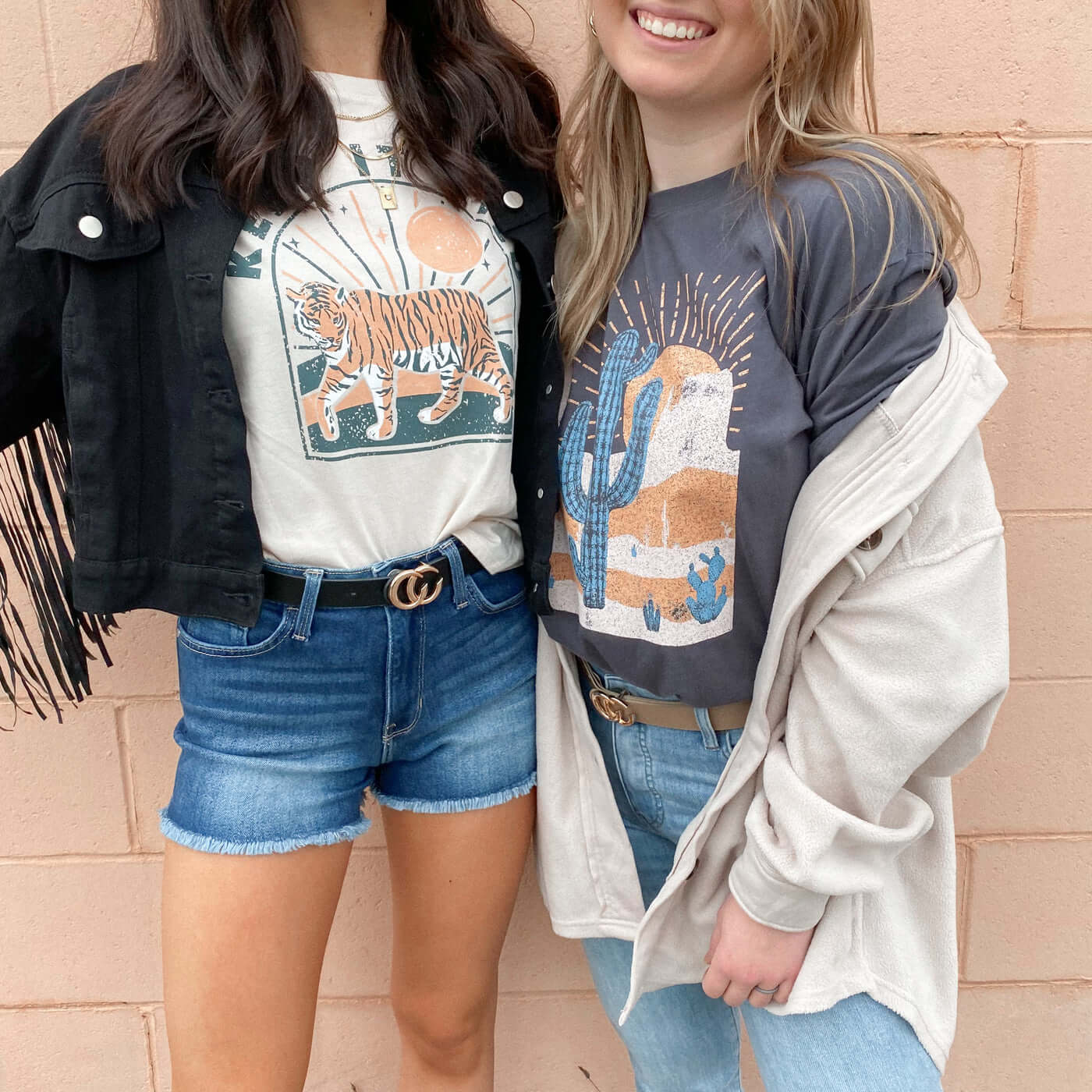 Women wearing graphic tees, shackets, and denim.