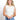 Model is wearing a white scarf hem sweater.