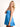 Model is wearing a blue cutout romper.