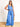 Model is wearing blue tie waist wide leg pants.