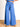 Model is wearing blue tie waist wide leg pants.