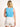 Model is wearing a light blue square neck cropped tank.