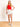 Model is wearing a white ruffled wrap front mini skort.