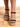 Model is wearing black and ivory crochet trim wedge sandals.