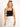 Model is wearing a black square neck crop tank.