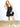Model is wearing a washed black knit dress.