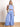 Model is wearing lavender wide leg pants with elastic waistband.