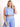 Model is wearing a lavender sleeveless bubble crop top.