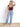Model is wearing a maroon short sleeve v-neck top.