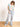 Model wearing light wash, distressed, baggy jeans.