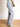 Model wearing light wash, distressed, baggy jeans.