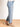 Model is wearing medium wash mid rise cropped wide leg jeans.