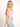Model is wearing a light pink square neck crop tank.