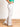 Model is wearing white super high rise flare jeans.